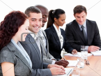 Assertive multi-ethnic business people in a meeting
