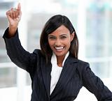 Successful businesswoman with a thumb up standing