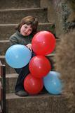 girl with balloons outdoor