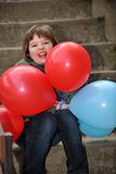 girl with balloons outdoor