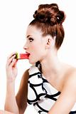 Young Woman Eating Fruit - Isolated