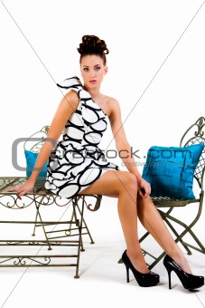 Young Woman Sitting on Table - Isolated