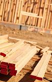 Stack of Building Lumber at Construction Site with Narrow Depth of Field.