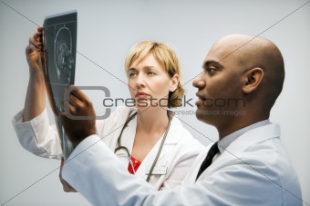 Physicians reading xray.