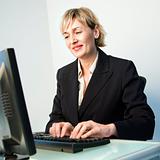 Businesswoman typing.