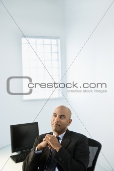 Businessman at office desk.