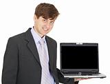 Friendly smiling person holds laptop on hand