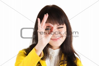 Young businesswoman doing the okay sign