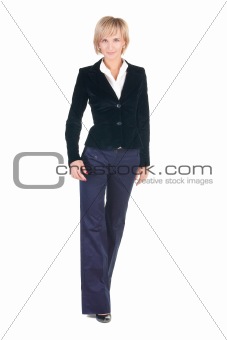 Young attractive blonde businesswoman walking. 