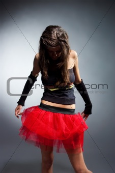 dancing girl in red skirt