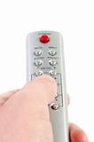 Hand holding  remote control. 