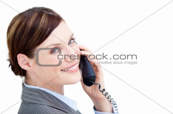 Radiant businesswoman talking on phone 