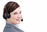 Bright businesswoman with headset on 