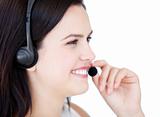 Happy businesswoman wearing a headset to talk with customer 