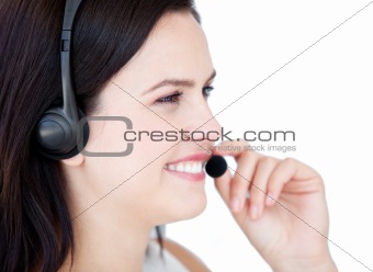 Happy businesswoman wearing a headset to talk with customer 