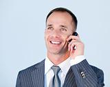 Handsome businessman talking to the phone