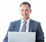 Smiling businessman surfing on the internet