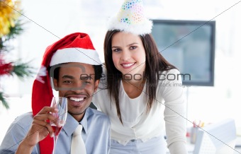 Business partners drinking to celebrates christmas 