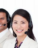 Two customer service agents with headset on