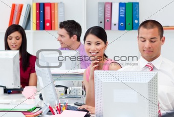 International business people working at computers