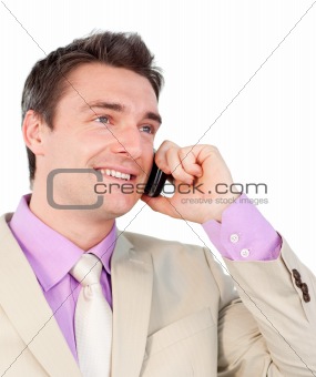 Smiling young businessman on phone 