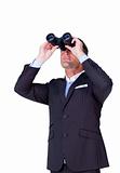 Confident businessman using binoculars 