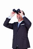 Attractive businessman looking up with binoculars