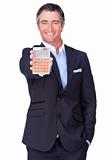 Attractive businessman holding a calculator 