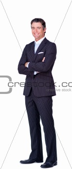 Attractive businessman with folded arms 