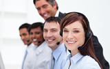 Positive business people working in a call center
