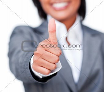 Close-up of a businesswoman with thumb up