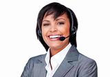 Portrait of a smiling hispanic businesswoman with headset on