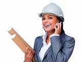 Female architect on phone bringing blueprints 
