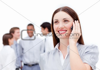 Attractive female manager using a mobile phone
