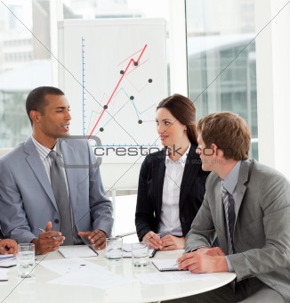 Manager and his team discussing a new strategy