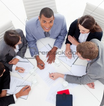 High angle of business people studying a new budget plan