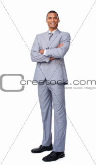 Young businessman with folded arms