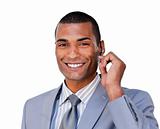 Portrait of a charismatic businessman on phone