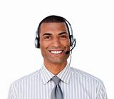 Attractive ethnic businessman with headset on 