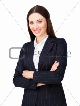 Smiling young businesswoman with folded arms 