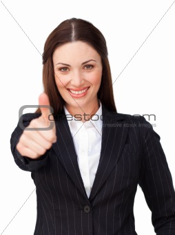 Young businesswoman with thumb up 