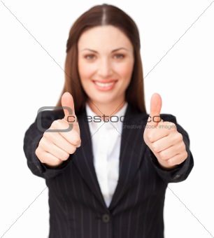 Young businesswoman with thumbs up 