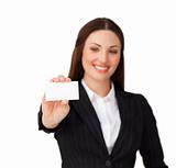 Confident businesswoman holding a white card 