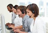 Multi-ethnic business people in a call center