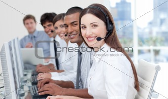 Positive business partners with headset on working in a call center