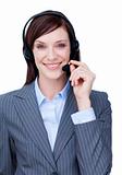 Portrait of a smiling businesswoman with headset on