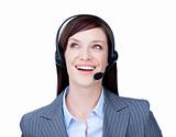 Laughing businesswoman with headset on