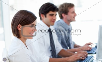 Animated business people working at computers