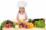 Happy little chef with vegetables