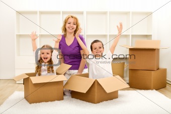 Happy people moving in a new home